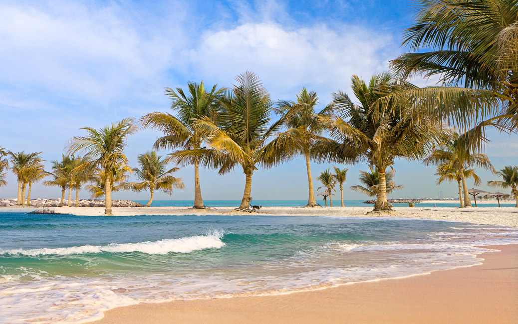 Beautiful Beach with palm tree &copy; eleana / Shutterstock.com